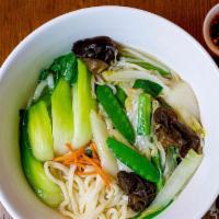 Plain Rib Noodle Soup · A cut of meat including the rib. soup that is made with plain rib broth noodles and vegetabl...