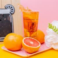 D. Grapefruit Mountain Iced Tea · With Orange and Lemon slices