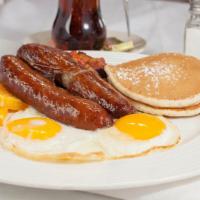 Due’s Combo · 2 buttermilk pancakes, choice of bacon, ham, Italian sausage or chicken apple sausage and ho...