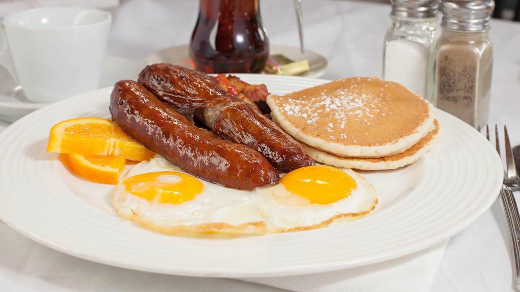 Due’s Combo · 2 buttermilk pancakes, choice of bacon, ham, Italian sausage or chicken apple sausage and house potatoes.