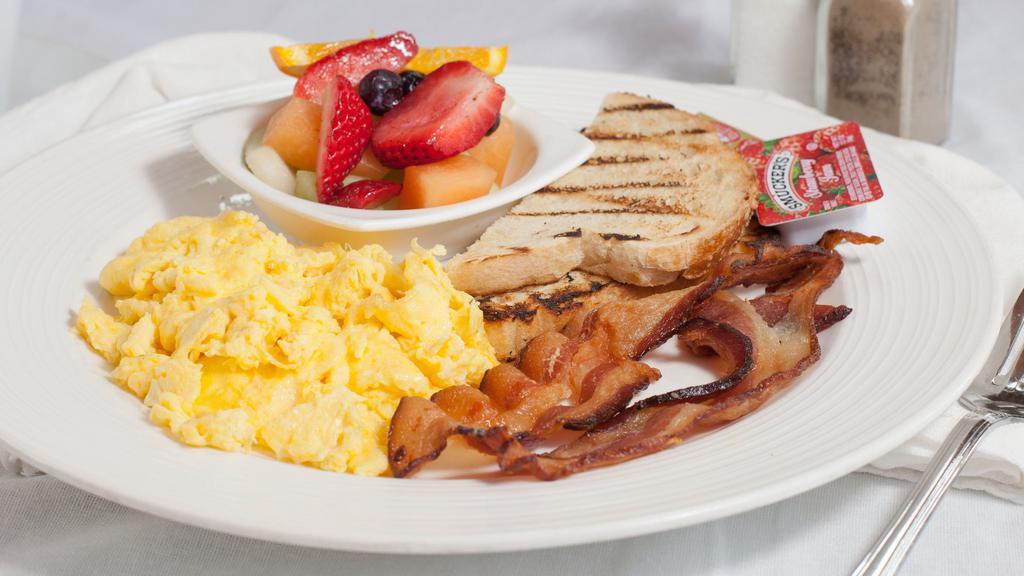 House Breakfast · 2 eggs any style, choice of bacon, ham, Italian sausage or chicken apple sausage, house potatoes and toast.