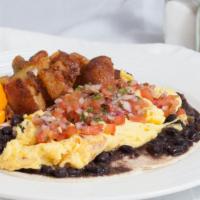 Huevos Rancheros · 2 flour tortillas, black beans, 2 fried eggs, and pico de gallo and house potatoes.