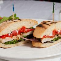 Grilled Chicken Sandwich · Grilled free range chicken, roasted red peppers, tomato, greens, lemon aioli on ciabatta.