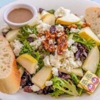 D'Anjou Pear and Dried Cranberry Salad · Mixed greens, sugared walnuts and goat cheese with balsamic dressing.