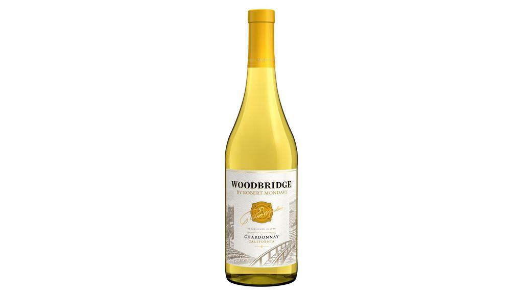 Woodbridge Mondavi Chardonnay (750 ml) · Woodbridge by Robert Mondavi Chardonnay White Wine unveils aromas of pear complemented by subtle oak and cinnamon. This California chardonnay wine's light to medium body and vibrant acidity showcase characteristic flavors of peach and apple, leading to a toasty finish with vanilla oak notes. Pair this California chardonnay wine with light appetizers as well as hearty dishes like roast chicken with white truffle risotto, or take time to indulge, sipping this chardonnay wine on its own. Grapes in this California white wine are sourced from vineyards where warm days and cool breezes permit the grapes to mature fully for nicely balanced, well-rounded flavor. Oak aging on the lees further enriches this Woodbridge chardonnay's texture and complexity. For best flavor, serve slightly chilled. This fresh yet silky wine is perfect for enjoyment every day. Please enjoy our wines responsibly. ¬© 2021 Woodbridge Winery, Acampo, CA