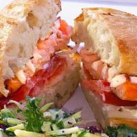 Salmon Sandwich · 6oz Atlantic salmon onion tomato mayonnaise ciabatta