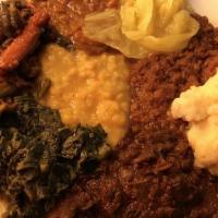 Vegetarian Combination  · Red lentil, split peas, collard greens, cabbage and potato, string beans and carrots.