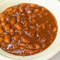Baked Beans · We begin with dried pintos, soak 'em, drain and rinse, cook and then season and bake these t...