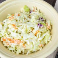 Cole Slaw · We use our own sweet and tangy cole slaw dressing over green and purple cabbage and carrots.