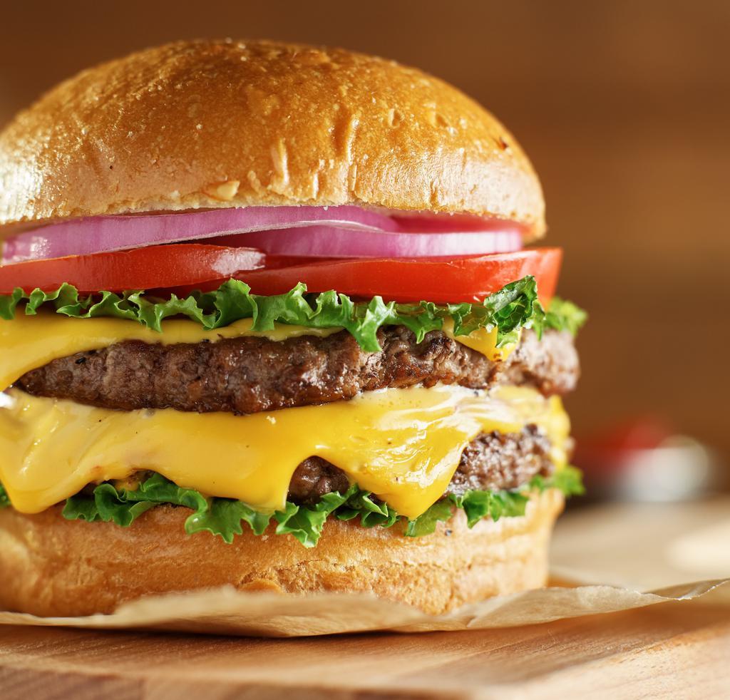 The Double Cheese Burger · Classic burger made with two 1/3 pound of Angus beef, farmers market lettuce, red onions, chopped tomatoes, mayonnaise, ketchup, and mustard, & your choice of cheese