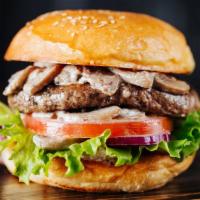 The Mushrooms Burger · Classic Burger made with 1/3 pound of Angus beef, farmers market lettuce, red onions, choppe...