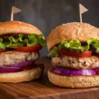 The Turkey Burger  · Classic Turkey Burger made with Turkey, farmers market lettuce, red onions, chopped tomatoes...