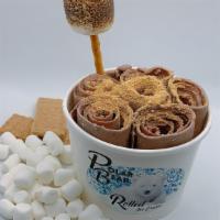 #7 - Smores · Ice Cream: Chocolate Base,  Graham Crackers, Marshmallows

Toppings: Whip Cream, Chocolate S...