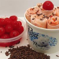 #18 - Cherry Bomb · Ice Cream: Vanilla Base, Cherries, Chocolate Sprinkles

Toppings: Whip Cream, Chocolate Spri...