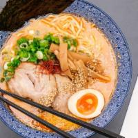 Spicy Miso Ramen · Wheat noodle with outstanding koshi in our spicy dashi broth flavored with miso and chicken....