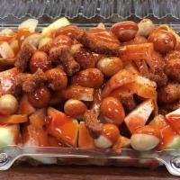 8. Tostilocos/Dorilocos (Botanas) · Topped with pickled pork skin, cucumber, Japanese peanuts, lime juice, tamarind, chamoy and ...