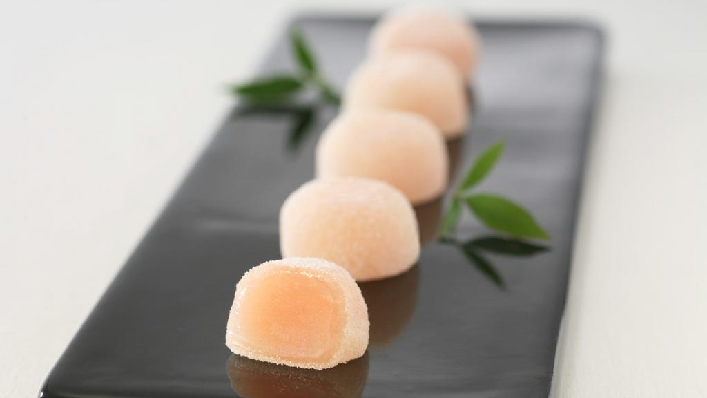 Minamoto Kitchoan White Peach Mochi (8 Pc) · Sweet white peach flavored bean paste wrapped with soft rice cake.