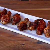 Mango Habanero Wings · Mary's natural chicken wings tossed in spicy mango and habanero sauce.