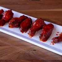 Honey Sriracha Wings · Mary's natural chicken wings tossed in honey sriracha sauce.