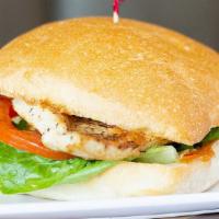 Chipotle Grilled Chicken Sandwich · Grilled chicken with chipotle aioli, lettuce, tomato on a ciabatta bun.