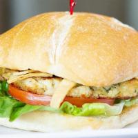 Southwestern Style Ground Chicken Sandwich · Fresh all-natural chicken spiked with serrano chili, lime and green tomatillo, serrano chili...