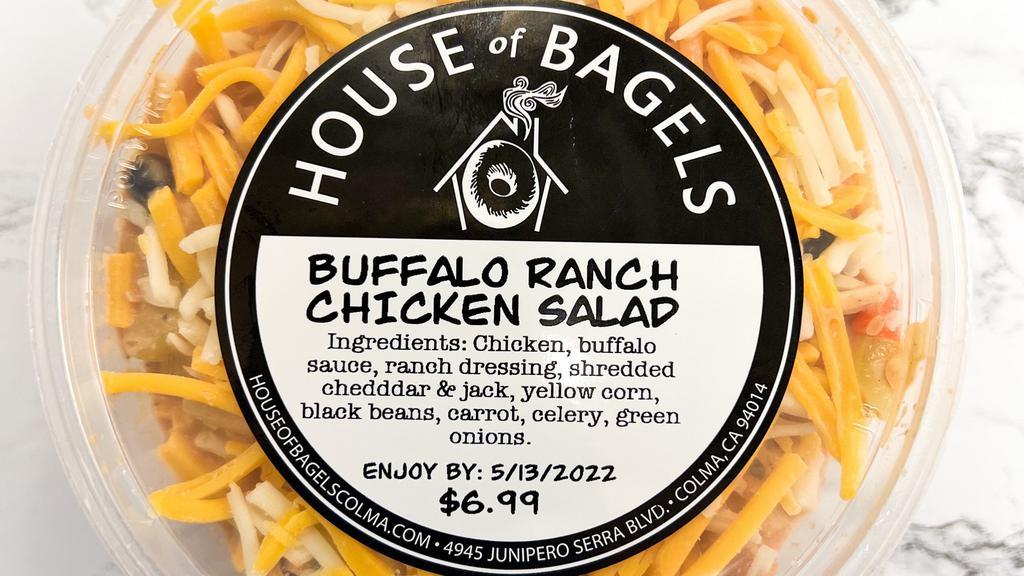 Buffalo Ranch Chicken Salad · Chicken, buffalo sauce, ranch dressing, shredded cheddar & jack, yellow corn, black beans, carrot, celery, green onions.