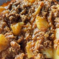 #24. Aloo Keema · Ground beef and potatoes cooked with onion, tomatoes and selected spices.