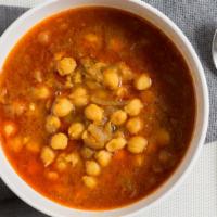 #27. Chana Masala · Chicks peas delicately cooked with selected exotic spices.