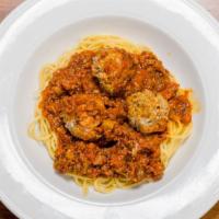 Italian Meatballs · Homemade meatballs served with homemade meat sauce and spaghetti pasta.