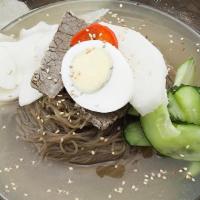 Mul Nang Myun · Cold noodles served in icy broth topped with radish cucumber, boiled egg and brisket.