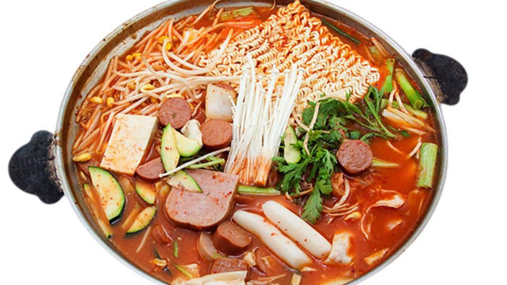 Boodae Jungol / 부대전골 · Hot assorted casserole served with vegetables, tofu, ham, sausages, and ramen.