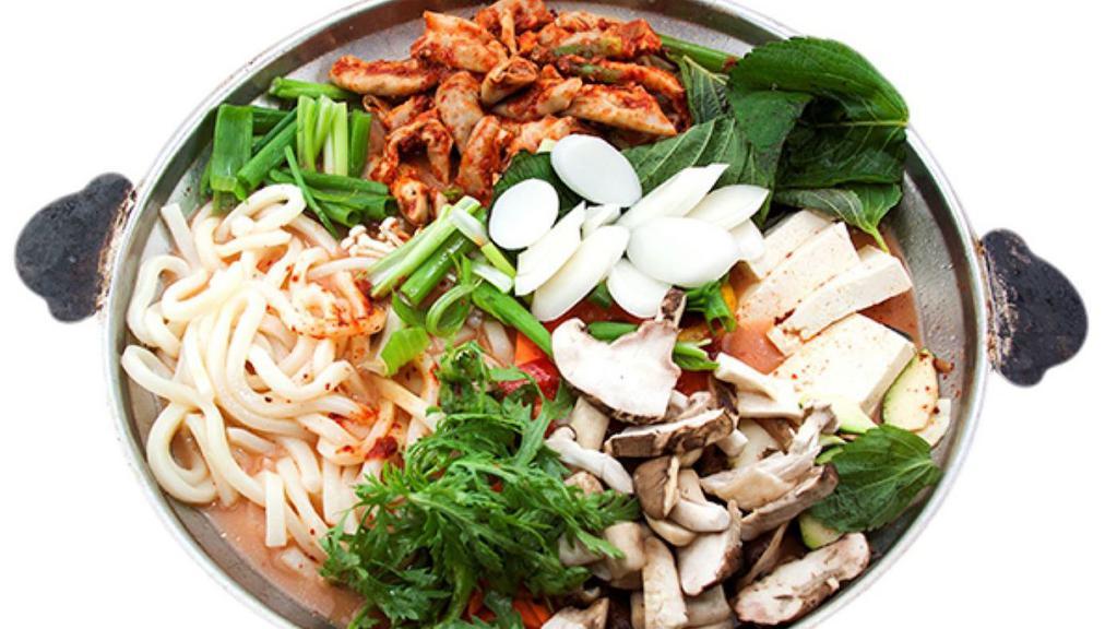 Gopchang Jungol · Hot assorted casserole served with vegetables, small intestine and udon noodles.