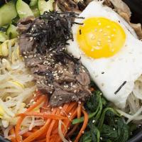 Hot Stone Bibimbap · Rice topped with assorted vegetables and egg.
*Choose topping( beef tofu,pork,or chicken)