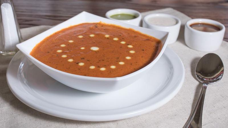 Butter Chicken · Roasted dark meat chicken simmered in a butter and creamy tomato cashew sauce, in our signature blend of spices.