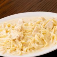 Chicken Fettuccine · A Californian style of classic Italian dish- fettuccine tossed with butter, Parmesan, chicke...