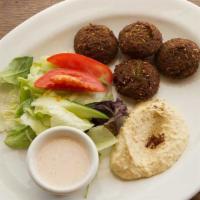 Falafel · Fried mashed garbanzo beans with parsley and spices, served with humus