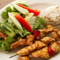 Chicken Shish Kebab · Marinated grilled chicken skewered served with rice and salad. Add salad, fries for an addit...