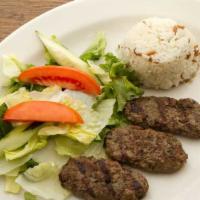 Kofte · Grilled, seasoned ground lamb and beef served with rice and salad. Add salad, fries for an a...