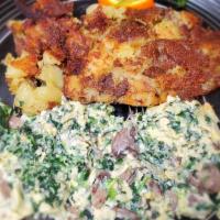 Gorgonzola Scramble · Spinach and mushrooms scrambled with gorgonzola cheese. Served with herb potatoes.