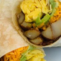 Vegetarian Breakfast Burrito · A nice number with onion marmalade, 2 eggs, melty cheddar, home fries ＆ avocado.