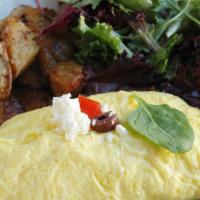 The Benaki Omelet · Three egg omelette with feta cheese, tomato, green onion, kalamata olives and spinach served...