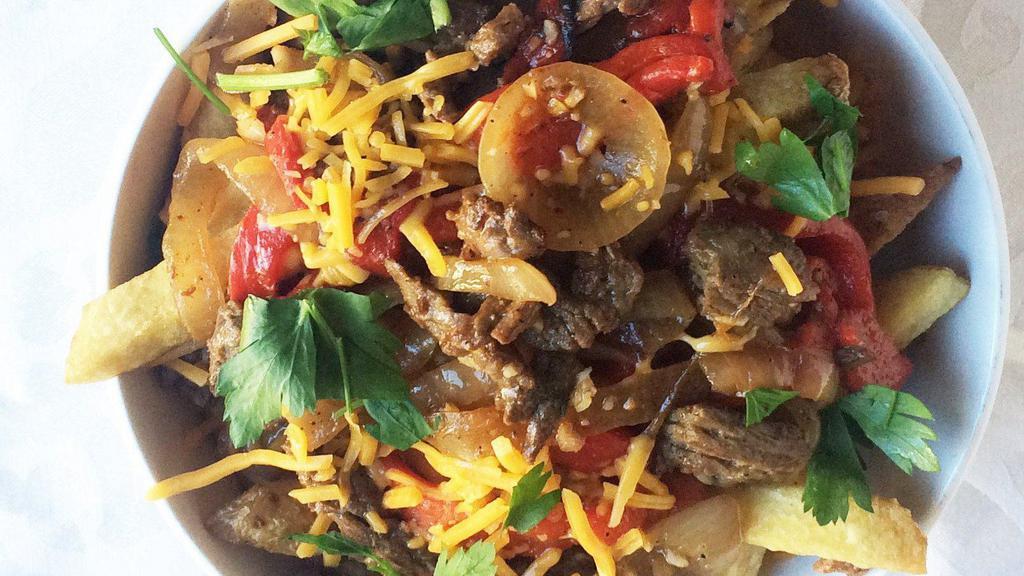 Philly Cheesesteak Frjtz · Philly cheesesteak frjtz loaded fries with grilled steak, melty cheddar cheese, grilled onions, roasted red bell peppers.