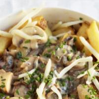 Creamy Mushrooms ＆ Swiss Frjtz · In a creamy and mushroom, Swiss and parmesan cheese sauce seasoned perfectly.