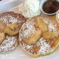 L'Hermitage Pancakes · 2 buttermilk pancakes served with caramelized apples, date butter, and pancake syrup.