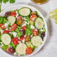 Greek (Side) · Crisp romaine, cucumbers, cherry tomatoes, Mediterranean olive-mix, and feta.