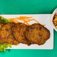 Fish cake · Ground fish mixed with a house made curry  paste, served with chunk cucumber in sweet chili ...