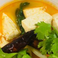 Tom Yum Soup · Gluten -free spicy and tangy soup, galangal, lemongrass, kaffir lime leaves, organic mushroo...