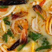 Milky Tom yum soup · Gluten -free spicy and tangy milky soup, galangal, lemongrass, kaffir lime leaves, organic m...