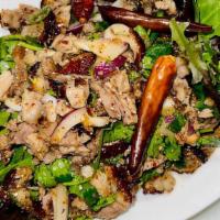 Mighty Duck Larb salad · Gluten free A chunk of roasted duck mixed with rice powder, chili powder and lime base salad...