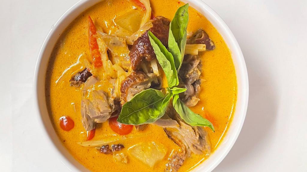 Pineapple Duck Curry (แกงคั่วเป็ด) · Gluten-Free. Roasted duck, Thai eggplant,  Red bell, fresh pineapple, Thai basil, bamboo shoots,  carrot, Thai red curry, and  coconut milk